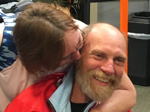 Woman Kissing Man on the Cheek